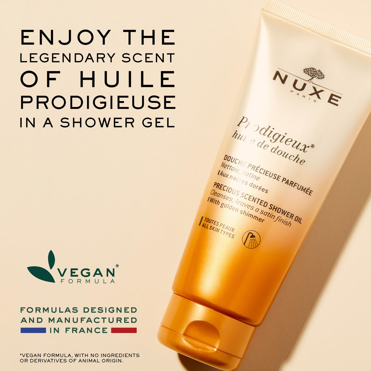 NUXE bottle held in hand for size comparison showing convenient 6.7 fl oz travel-friendly