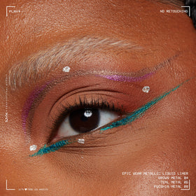 NYX PROFESSIONAL MAKEUP face and body art using brown metal liner for flash-tattoo effects