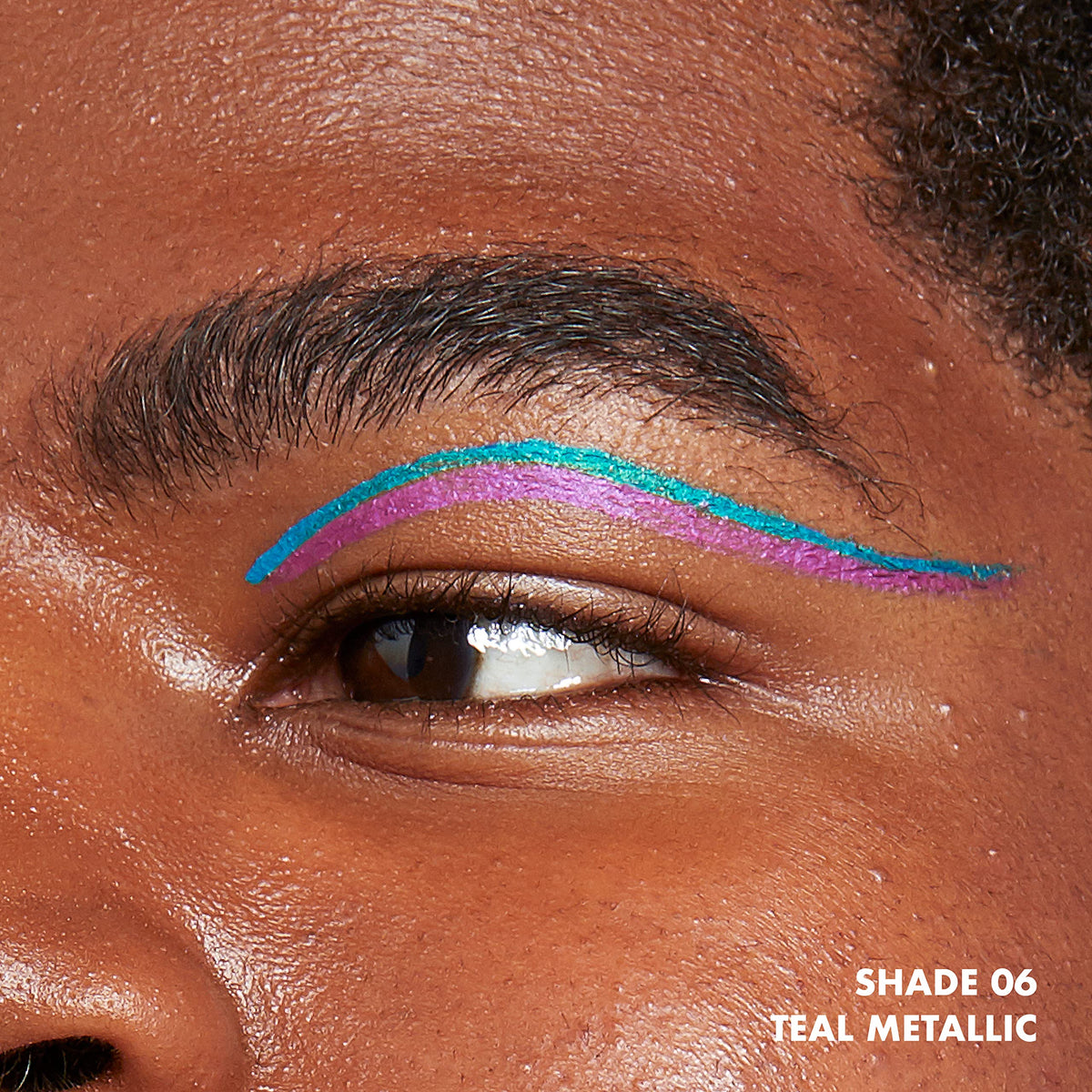 NYX PROFESSIONAL MAKEUP single teal metallic stroke on skin showcasing high pigment payoff