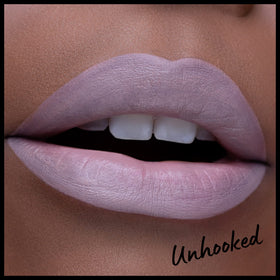 NYX PROFESSIONAL MAKEUP swatch on arm showing grey-toned beige color and opaque payoff