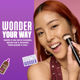 NYX PROFESSIONAL MAKEUP applying foundation with brush for even coverage