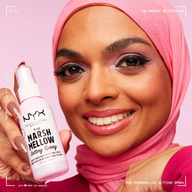 NYX PROFESSIONAL MAKEUP mist dispersing to show lightweight texture benefit