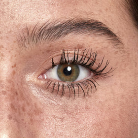 NYX angled mascara wand demonstrating hourglass-rounded applicator for root lift