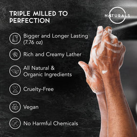 O NATURALS soap held in hand to show 7.76 oz scale and longevity