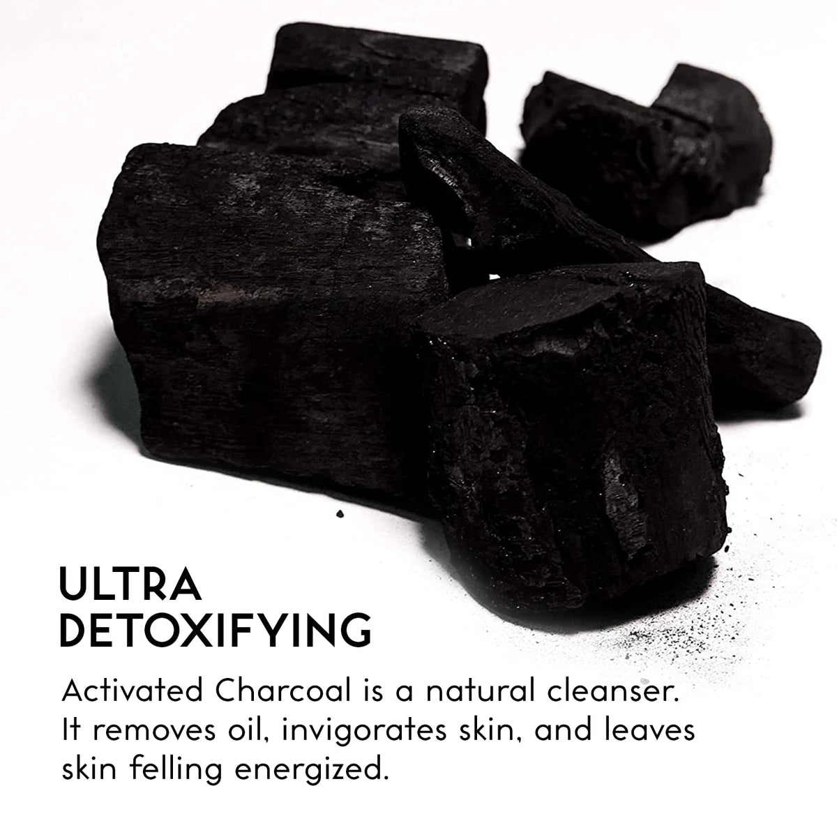 O NATURALS ingredients flatlay with charcoal, shea butter, peppermint clarity