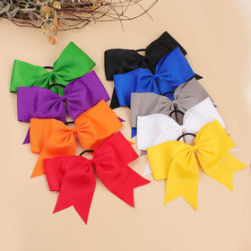OAOLEER hand holding 8-inch bow showing true jumbo size
