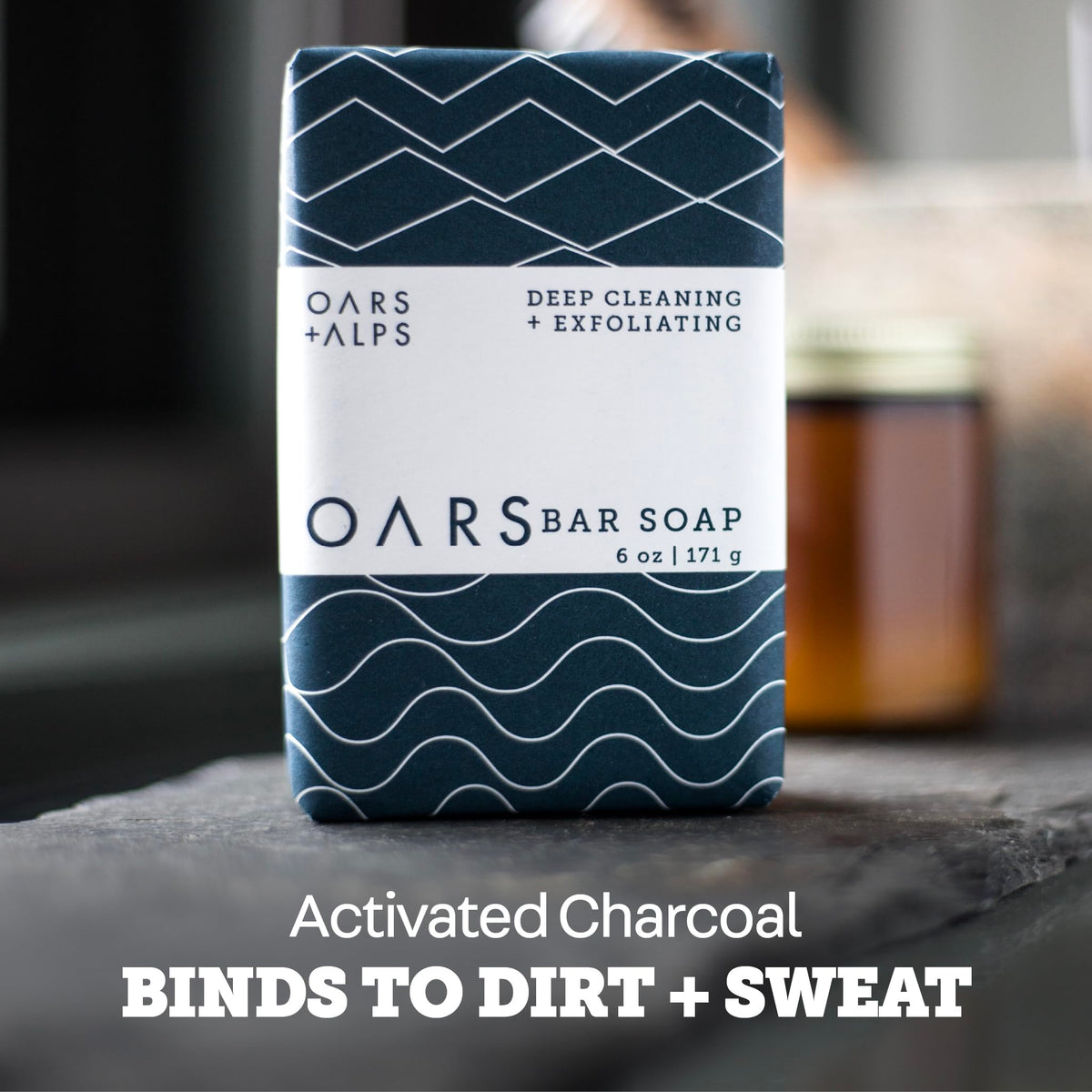 Oars + Alps bar in hand demonstrating compact travel-friendly size