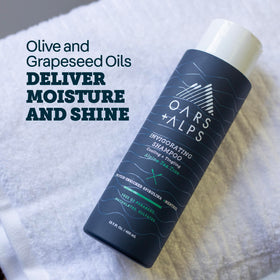Oars + Alps shampoo and conditioner displayed in bathroom showing routine pairing benefit