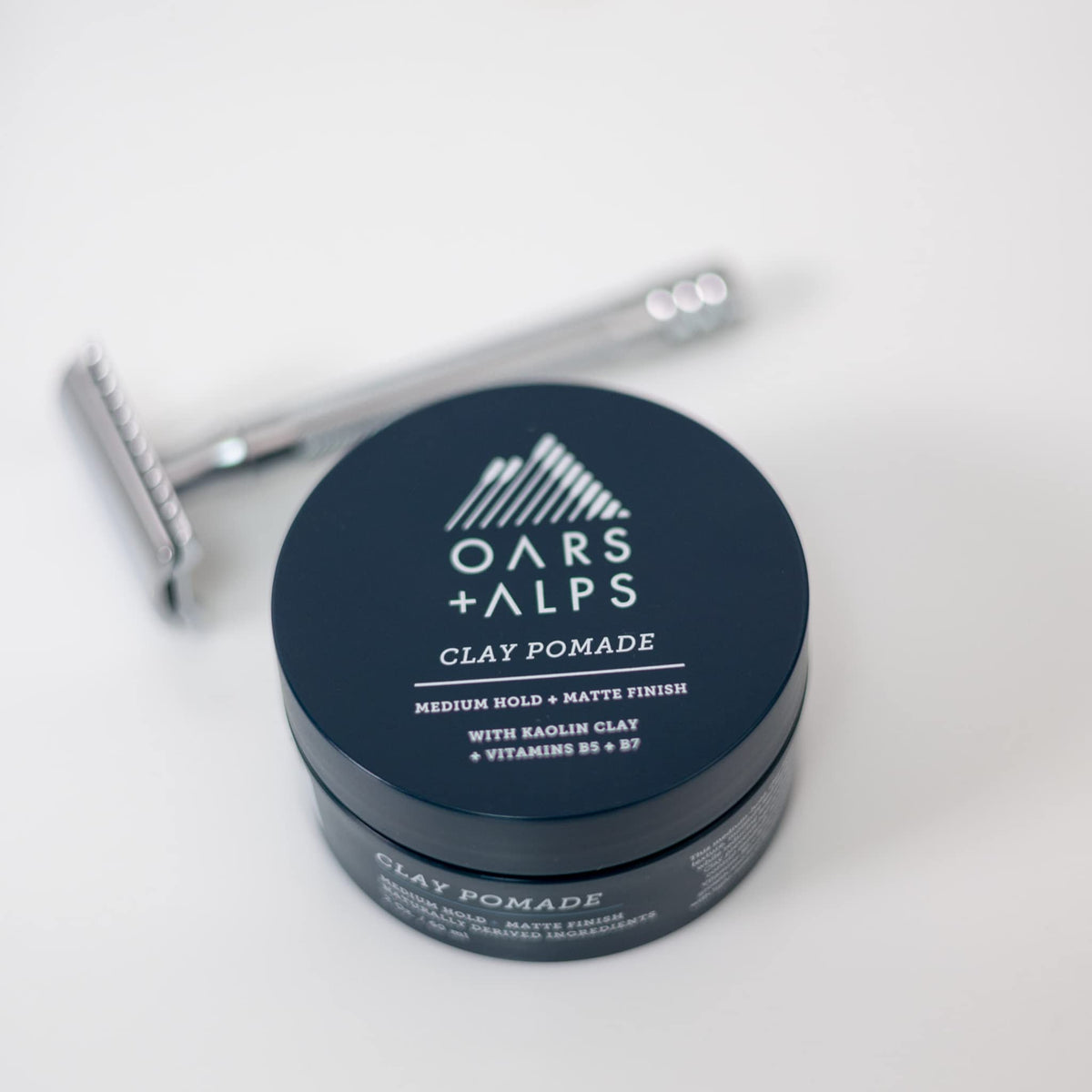 Oars + Alps clay and oils close-up showing conditioning ingredients