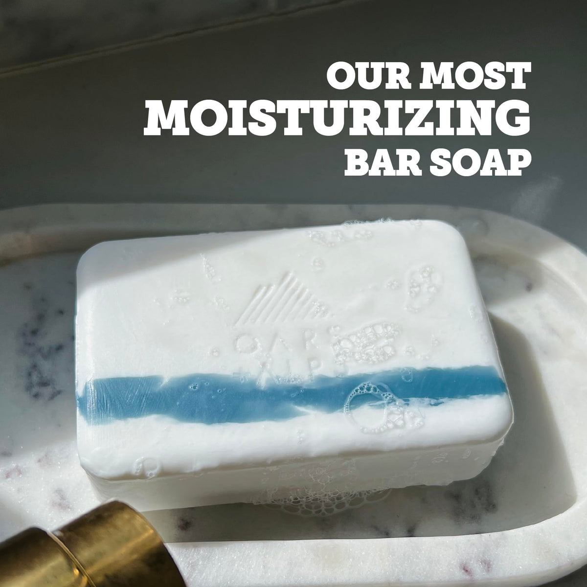 Oars + Alps creamy texture close-up highlighting smooth lather and skin nourishment