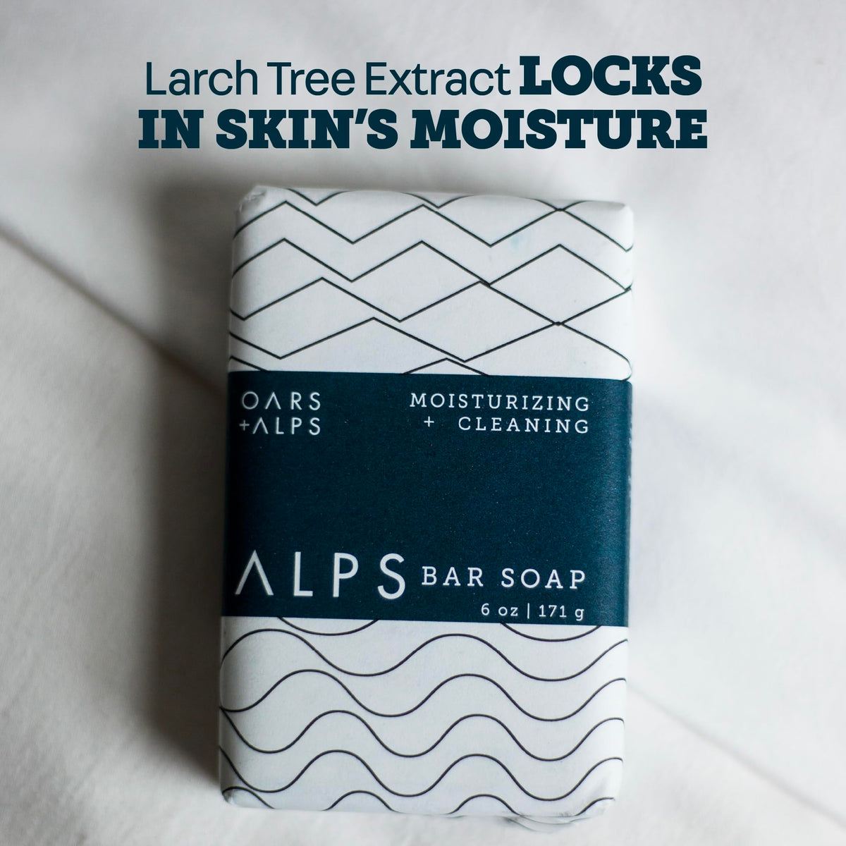 Oars + Alps ingredient label highlighting shea, jojoba, and clay benefits
