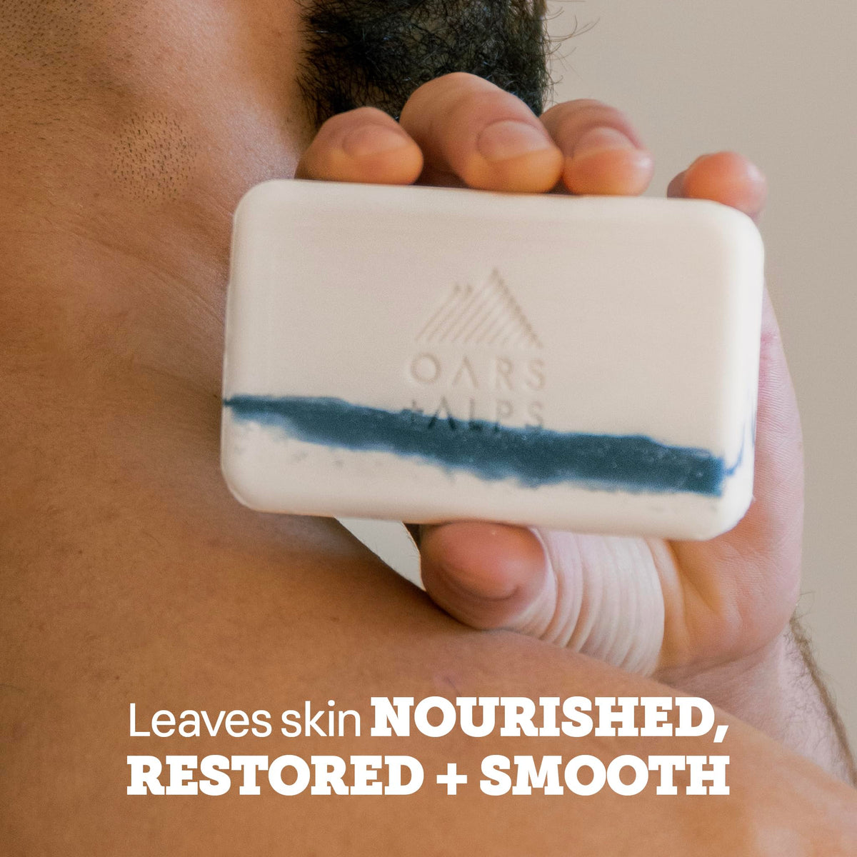 Oars + Alps rich lather in hand demonstrating cleansing power and hydration