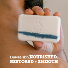 Oars + Alps rich lather in hand demonstrating cleansing power and hydration