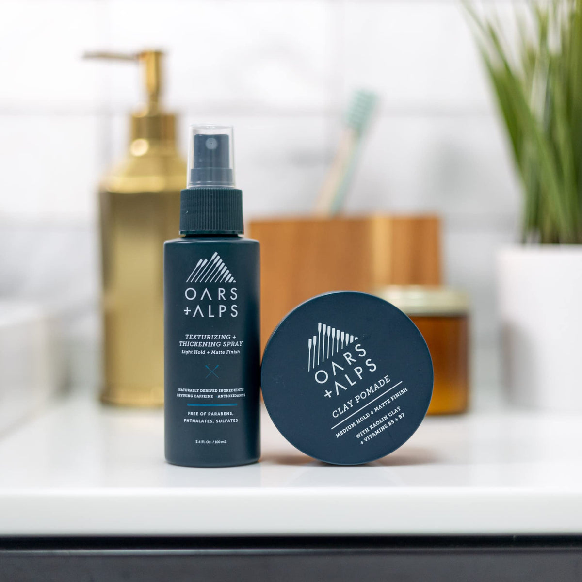 Oars + Alps jar on bathroom counter suggesting everyday grooming routine