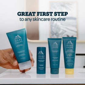 Oars + Alps tube on bathroom vanity suggesting a clean, hydrated skincare routine
