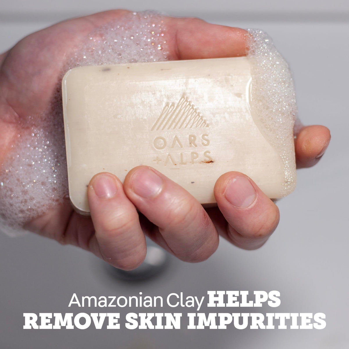 Oars + Alps soap used in outdoor shower showing deep-clean after activity