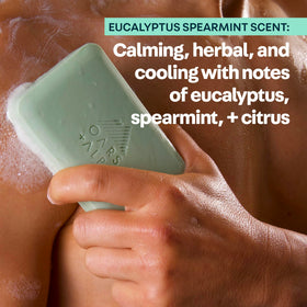 Oars + Alps soap bar in palm showing size and portable grooming convenience