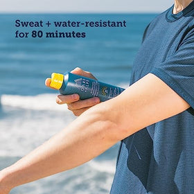 Oars + Alps 6 oz can in hand demonstrating compact travel size