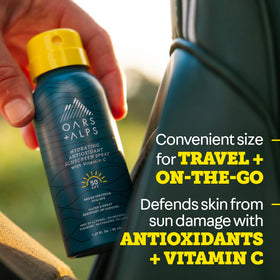 Oars + Alps sunscreen held in hand for size comparison showing portable travel benefit