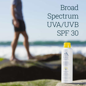 Oars + Alps sunscreen spray nozzle close-up highlighting mist delivery for quick coverage