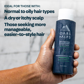 Close-up of Oars + Alps shampoo lather highlighting gentle foaming benefit