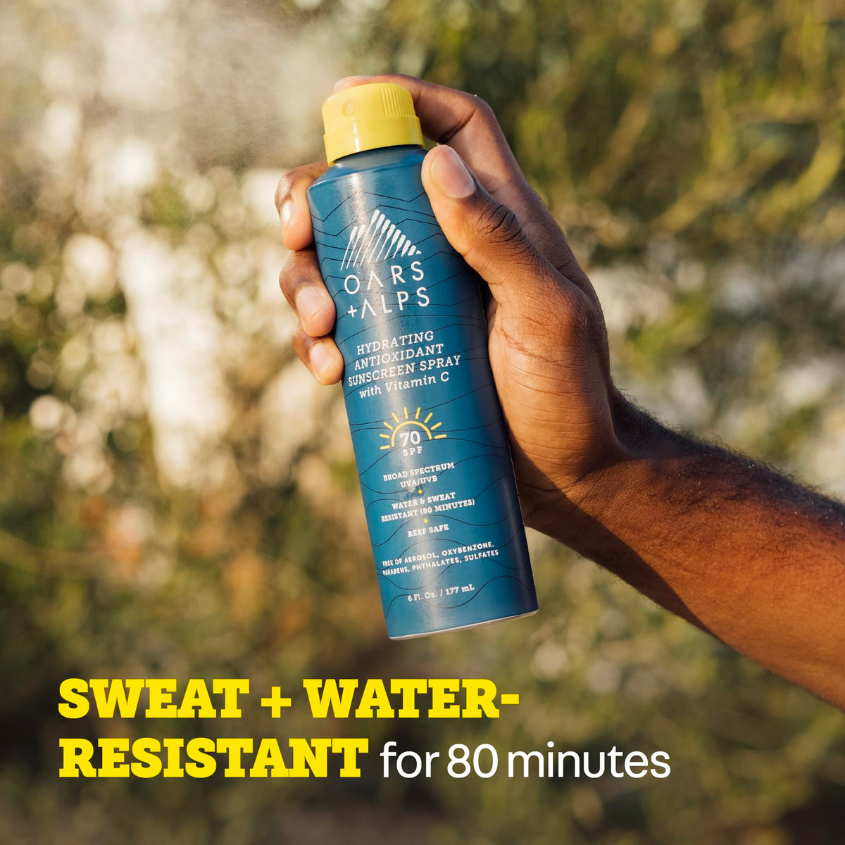 Oars + Alps being sprayed on forearm showing fast coverage and hydration benefit
