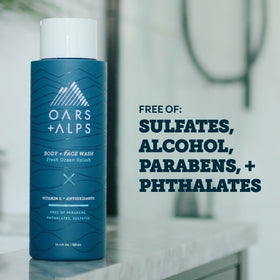 Oars + Alps bottle in hand for size scale and easy-control dispensing benefit