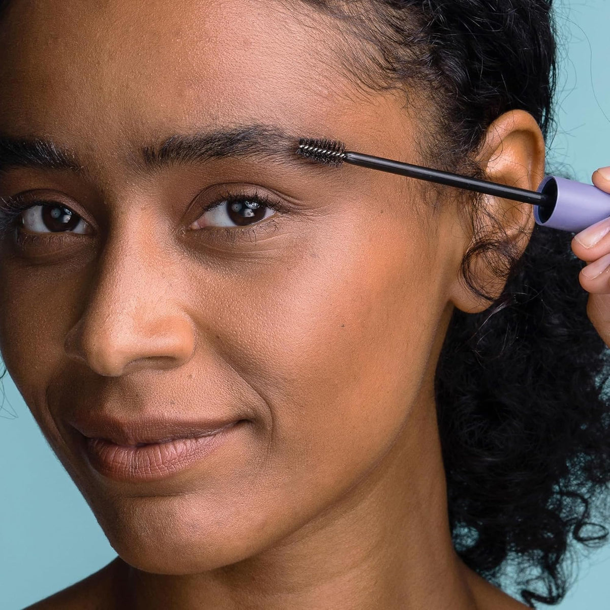 Obagi Nu-Cil ingredient layout visual showing Biotin and Hyaluronic Acid benefits