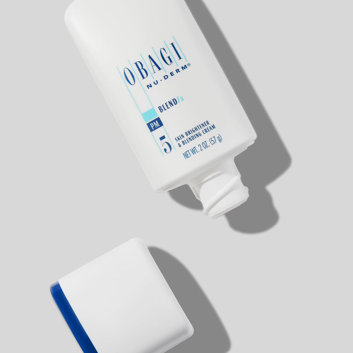 Obagi Medical jar in hand illustrating 2 oz size for accurate scale perception