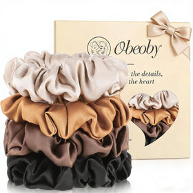 obeoby front packaging showing four coffee silk scrunchies and elegance