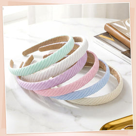 obeoby six light-colored headbands laid flat showing color variety
