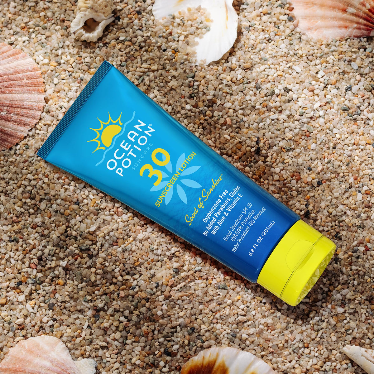 Ocean Potion applied on shoulder at beach demonstrating sun care