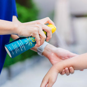 Ocean Potion by pool with stopwatch showing 80-minute water resistance