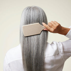 Odele product with clean-ingredient icons emphasizing vegan, sulfate-free