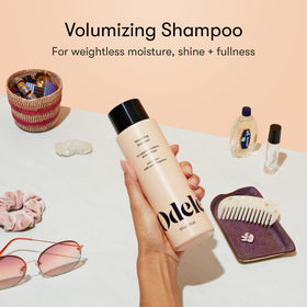 Close-up of Odele shampoo lather texture highlighting gentle cleansing
