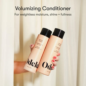 Odele conditioner pump nozzle close-up demonstrating easy dispensing and precise use