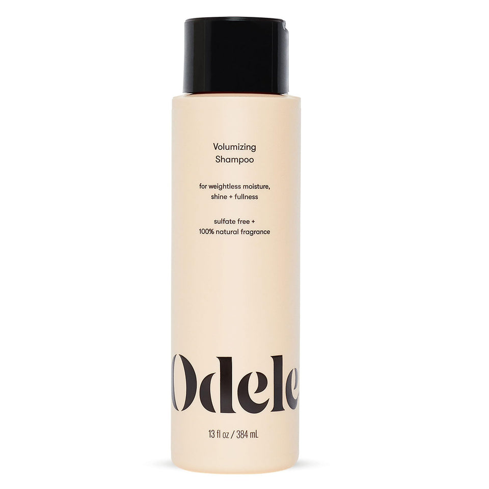 Odele bottle front label showing volumizing benefits and clean formulation