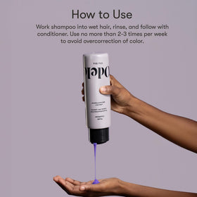 Odele shampoo being applied to wet hair to neutralize yellow tones