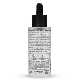 Odele serum 2 fl oz beside common object for size and portability