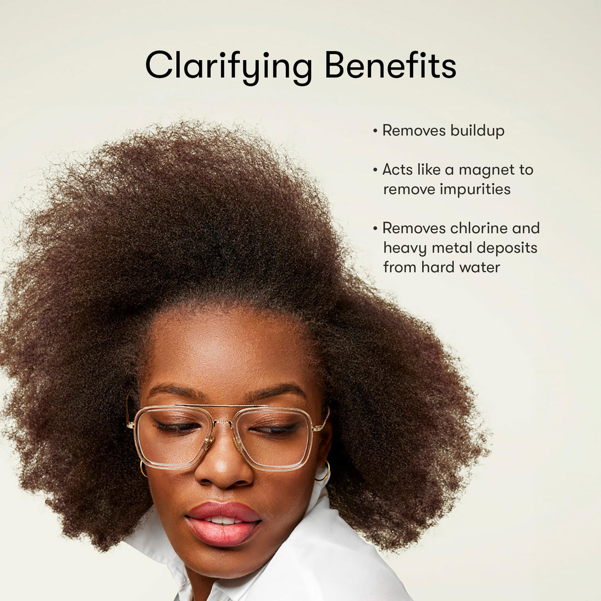 Odele shampoo in hand showing bottle size and travel-friendly benefit