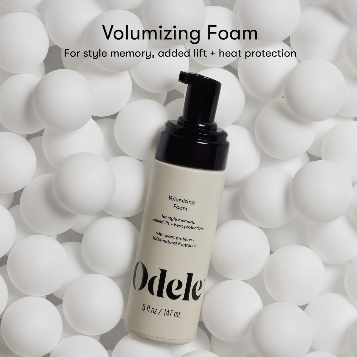 Odele foam texture close-up on fingertip, demonstrating airy hold