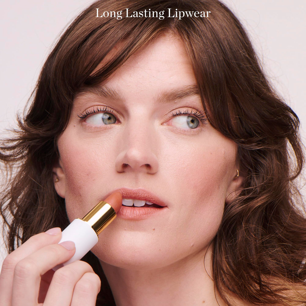 Ogee application on model lips Lulu displaying true pink shade and flattering effect