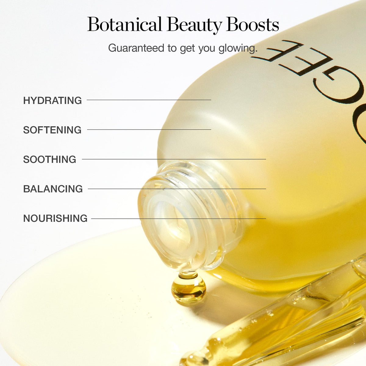 Ogee jojoba glow in hand to show bottle scale and easy application benefit