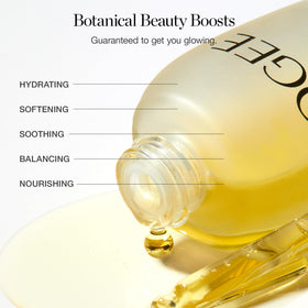Ogee jojoba glow in hand to show bottle scale and easy application benefit