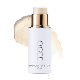 Ogee face stick front packaging showing compact organic design and glow
