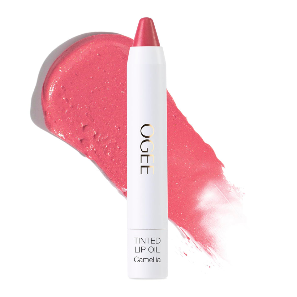 Ogee front view of Camellia lip oil showcasing sleek packaging and easy application benefit