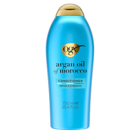 OGX front packaging showing 25.4 fl oz bottle and repair benefit