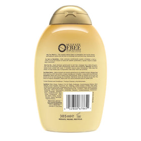 OGX bottle label close-up highlighting ingredients and product benefits visibly