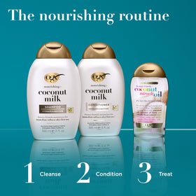 OGX conditioner held in hand for size comparison, shows convenient large bottle benefit