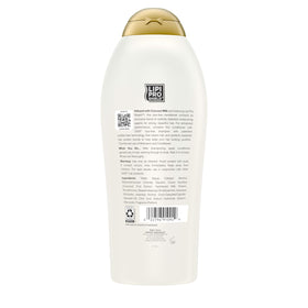 OGX bottle with coconut and peach props highlighting scent profile and nourishing benefit